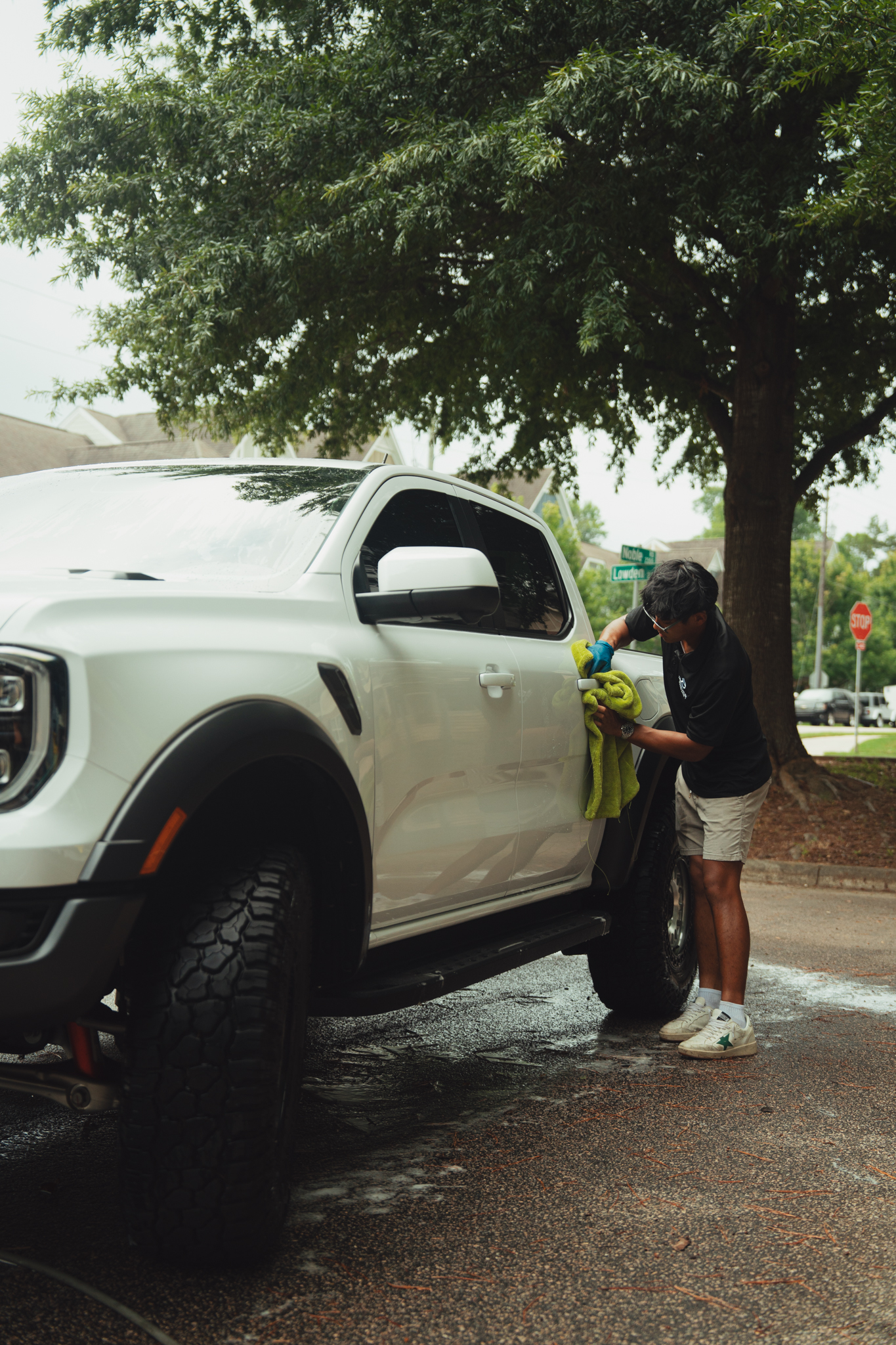 Professional Tang Detailing membership work on a client's vehicle in Raleigh NC